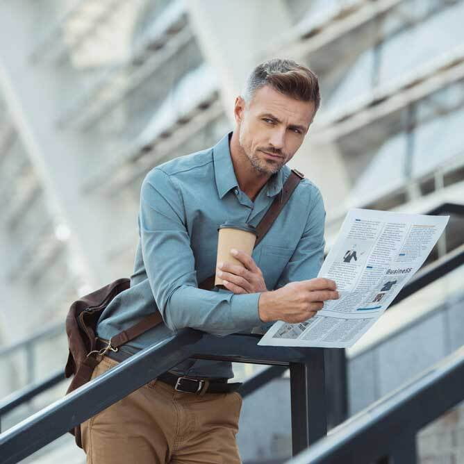 Relaxed corporate gent thinking about entrepreneurship